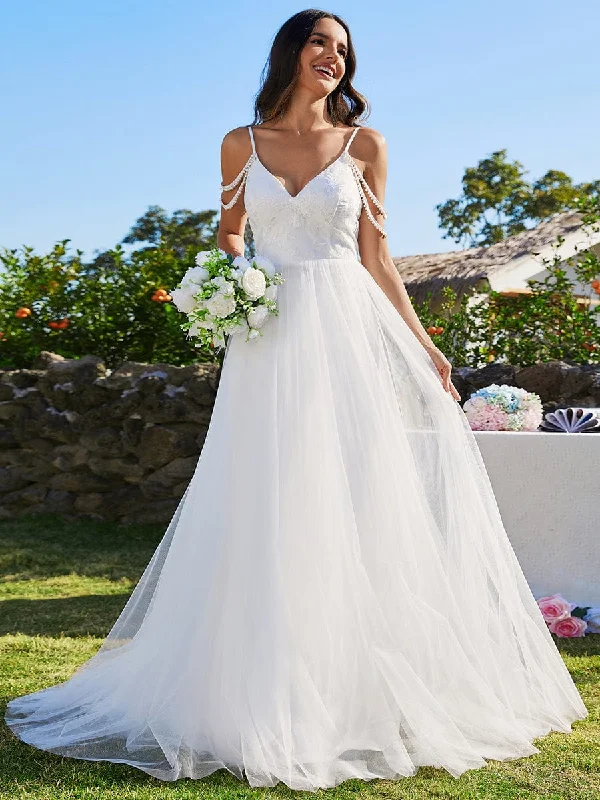 Shop & Get More A-Line Pearl Spaghetti Strap Embroidered Tulle Wedding Dress with V-Neck Shop & Get More A-Line Pearl Spaghetti Strap Embroidered Tulle Wedding Dress with V-Neck
